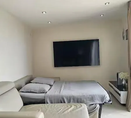 Maison De